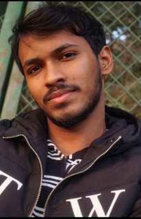 Santosh Kumar Shah portrait, young man in professional attire against neutral background